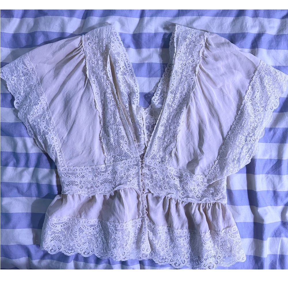 Rebecca Taylor medium blouse, low cut back & lace trim. Color: cream.